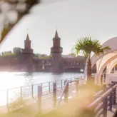 Event location Spreespeicher with a view of the Oberbaumbrücke bridge in Berlin